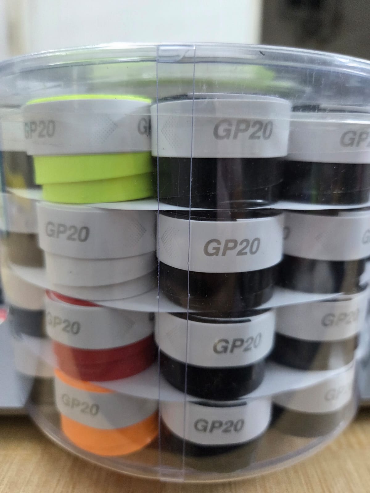 GP20 Badminton Over Grip - Side view showing Black, Neon Green, Red, Orange, Grey colors